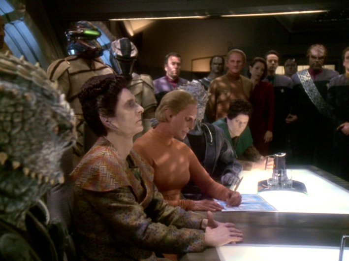 Female Changeling signs Treaty of Bajor.jpg